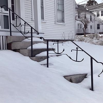 Double railings on 8 steps to porch.