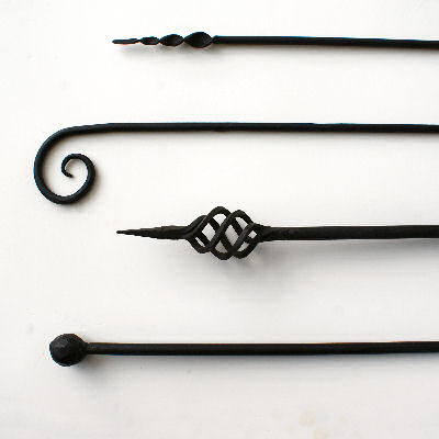 4 curtain rods with different ends. Spiral, scroll, basket and ball.