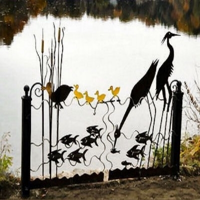 Wrought iron gate with birds and fish.