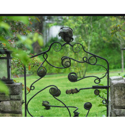 Garden gate in spring rain by blacksmith Andrew Leck.